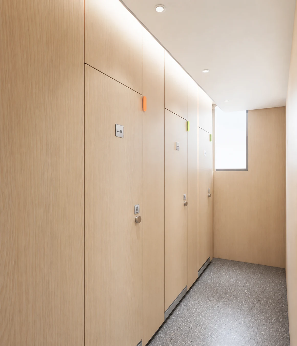Timber-finished restroom corridor in the Huili project